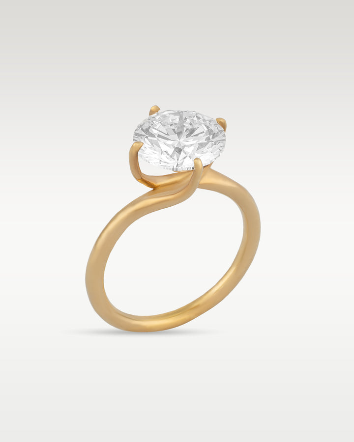 Four Prong Twist Solitaire Diamond Engagement Ring