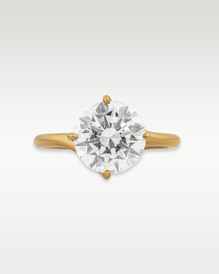 Four Prong Twist Solitaire Diamond Engagement Ring