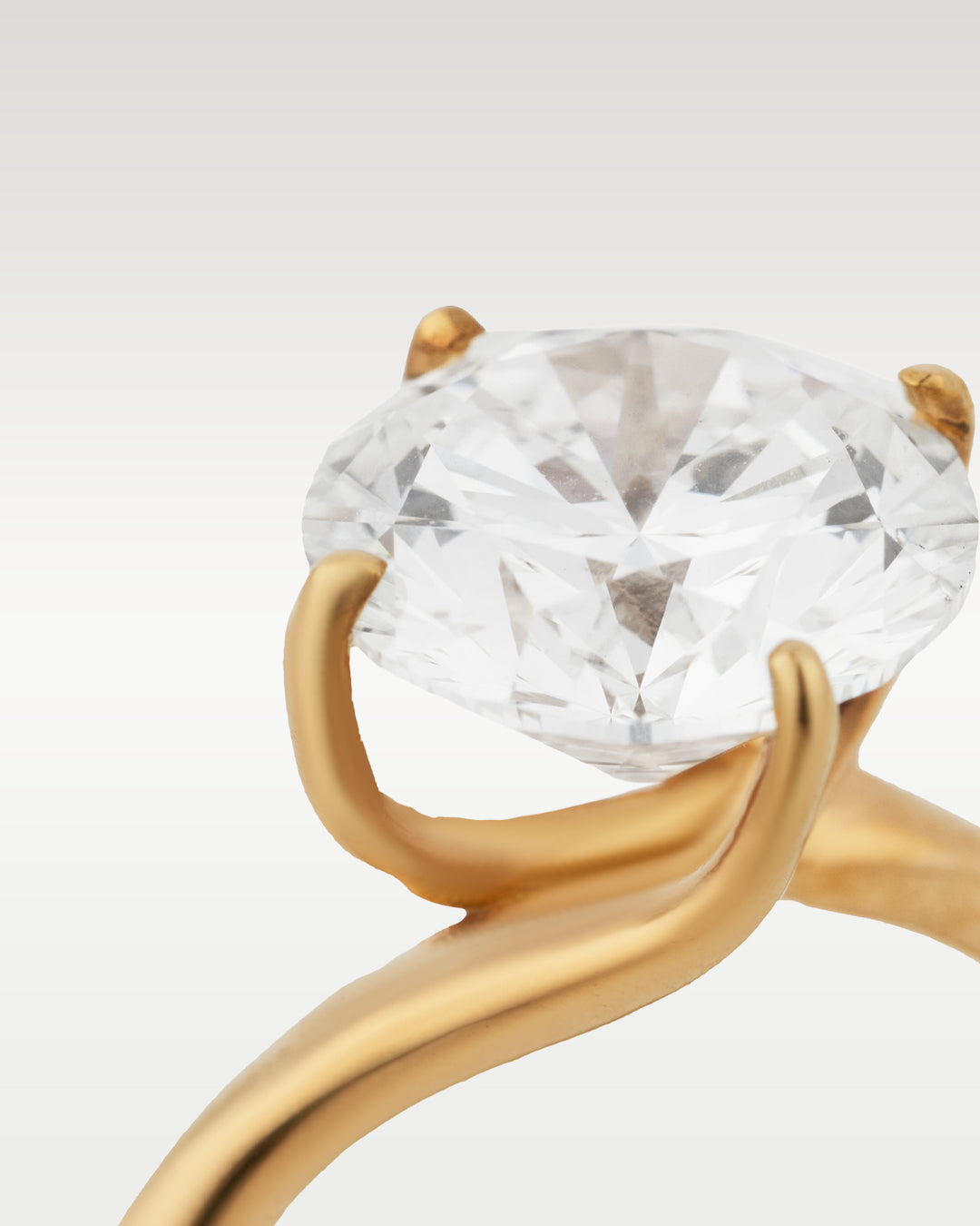 Four Prong Twist Gold Solitaire Diamond Engagement Ring | Bitton Diamonds Dallas